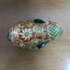Elefante indiano de madeira pintado a mão verde e dourado