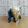 Elefante indiano de madeira pintado a mão verde e dourado