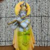 Estátua indiana de Krishna azul tocando flauta em resina pintada