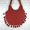Bolsa indiana Banjara toda bordada com tassel e berloque no centro