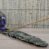 Incensário cabeça de Buda formato folha em resina roxo e dourado