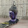 Incensário cabeça de Buda formato folha em resina roxo e dourado