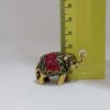 Incensário mini elefante em metal brass com embutimento de pedras naturais