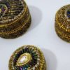 Conjunto com 3 latinhas indianas de miçangas design pavão dourado