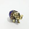 Incensário mini elefante em metal brass com embutimento de pedras naturais Lápis Lazuli