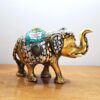 elefante indiano dourado com pedras