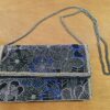 Bolsa clutch indiana de festa com miçangas preto e dourado