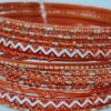 Conjunto de pulseiras indianas de metal com brilhos cor laranja