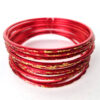 Conjunto de pulseiras indianas de metal com brilhos vermelha