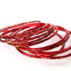 Conjunto de pulseiras indianas de metal com brilhos vermelha