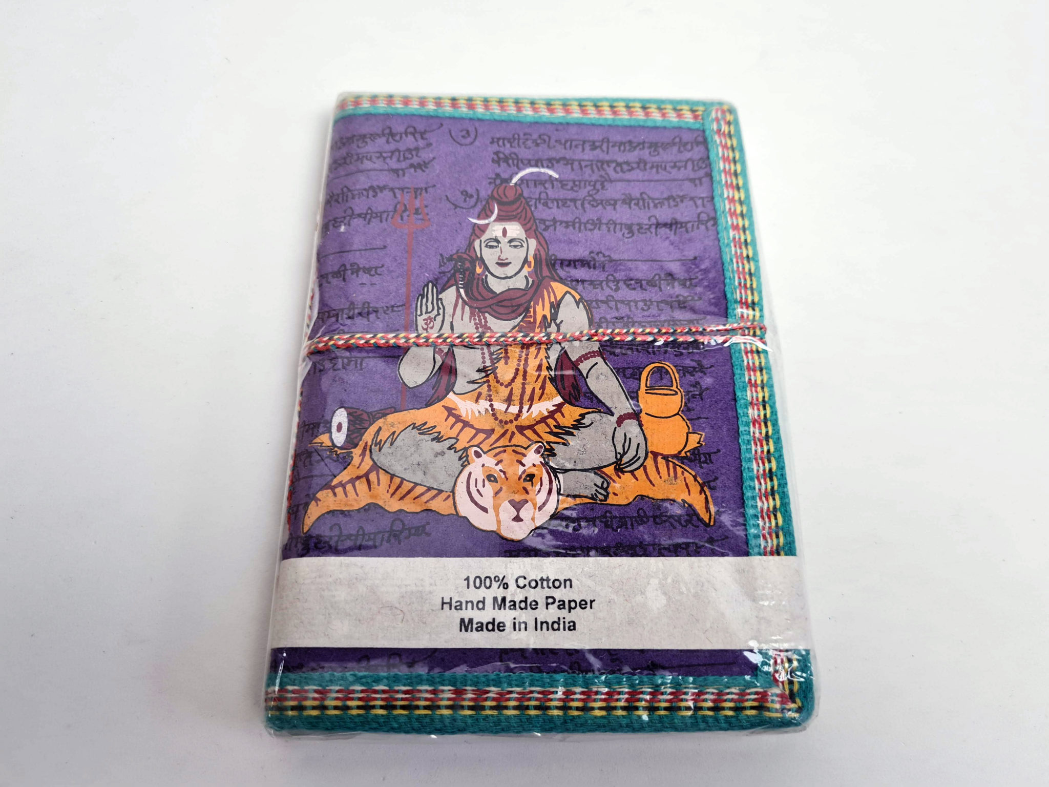 caderno indiano artesanal roxo com estampa de Shiva
