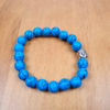 pulseira de pedras naturais com berloque de Buda