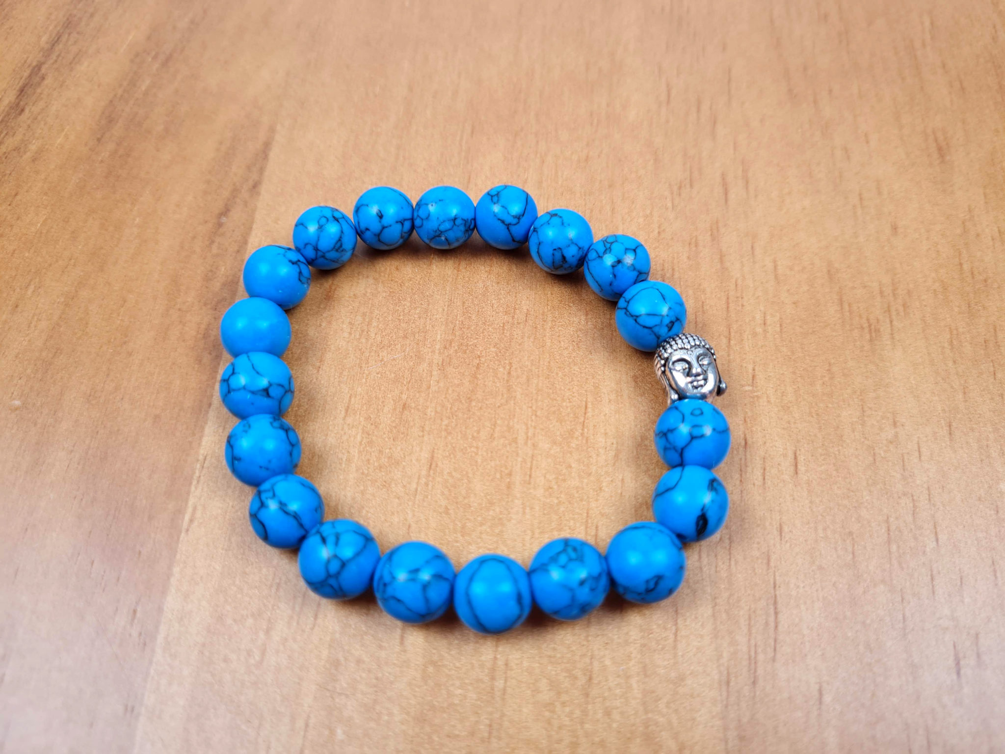 pulseira de pedras naturais com berloque de Buda
