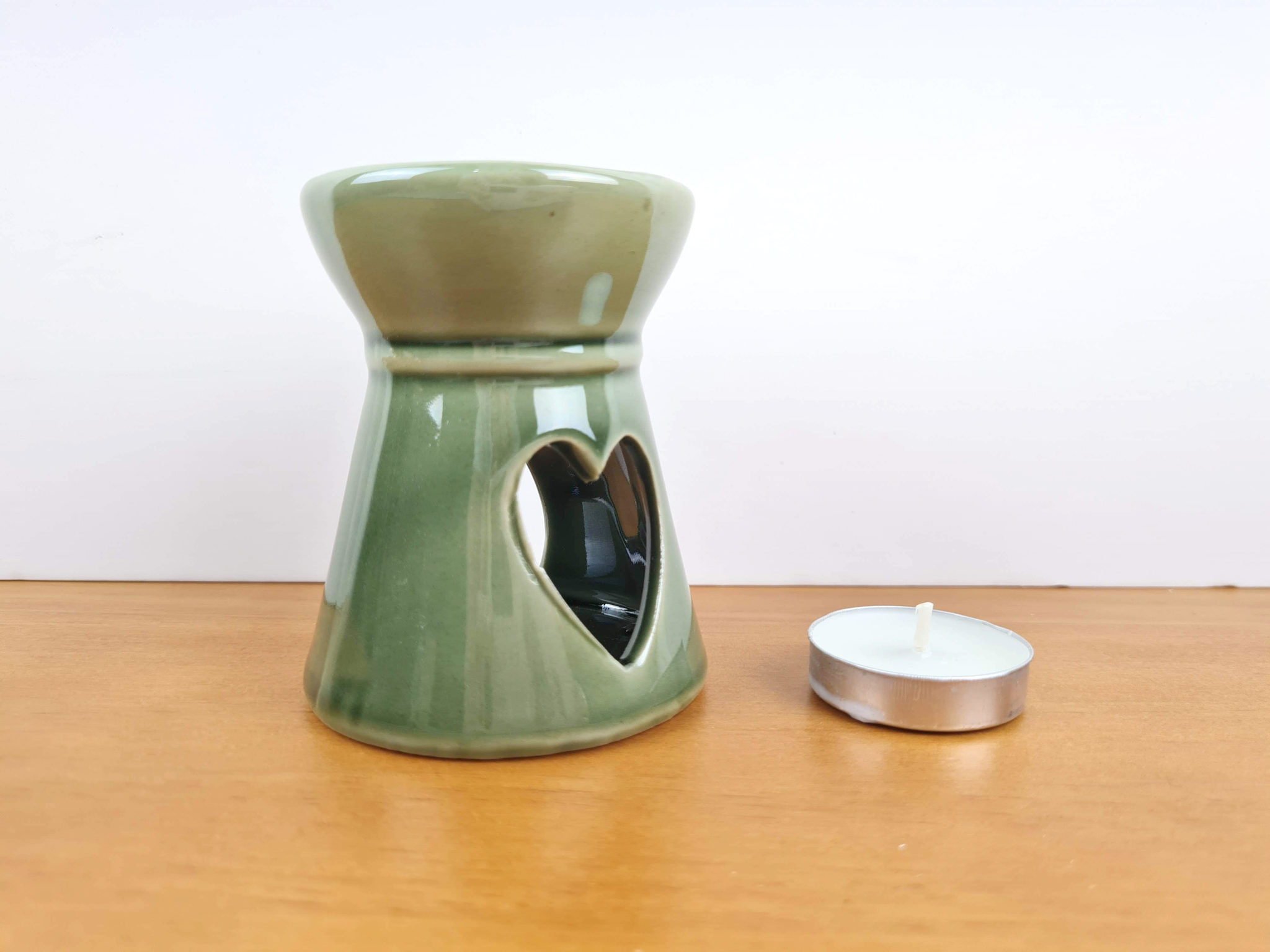 rechaud de vela de coração verde