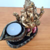 Estátua de Deus Ganesha sentado com vela para iluminar 14cm