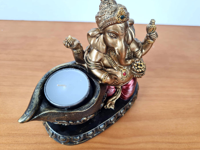 Estátua de Deus Ganesha sentado com vela para iluminar 14cm