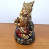 Estátua de Deus Ganesha sentado com vela para iluminar 14cm