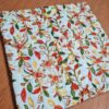 Capa de almofada indiana estampa floral bordada creme e color
