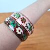 Duo de pulseiras indianas de metal esmaltadas elefantes rosa e vinho
