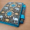 Caderno artesanal indiano estampa de camelos com caneta azul