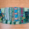 bolsa banjara indiana patchwork verde e coloridos com tassel