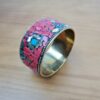 Bracelete indiano dourado com pedrarias coral e turquesa