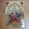 Lâmina dourada decorativa feita na Índia com deusa Lakhsmi lord Kubera Saraswati e ganesha