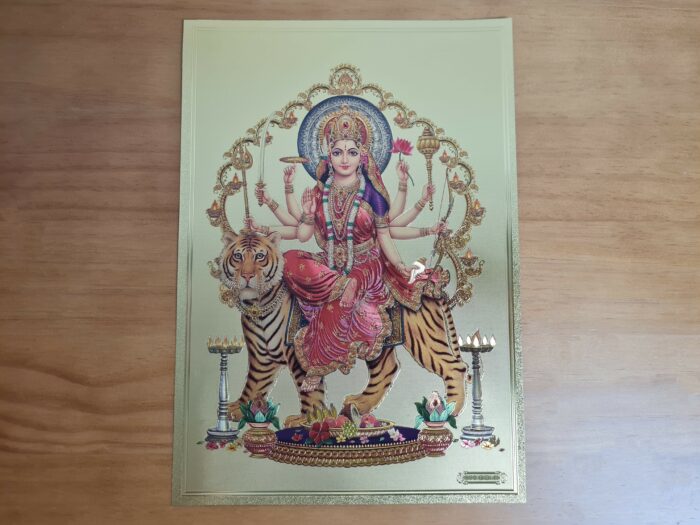 Folha laminada dourada em 30x21cm com a imagem da Deusa Durga. Lindo para colocar na parede com moldura.