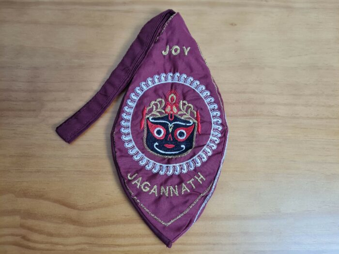 Bolsinha de japamala (bead bag) com estampa de Lord Jagannath (Krishna), vinho com verso bordado