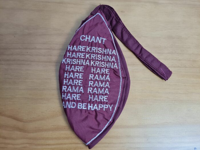 Bolsinha de Japamala estampa bordada de Jagannath vinho