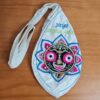 Bolsinha de japamala (bead bag) com estampa de Lord Jagannath (Krishna), cru e color com verso bordado