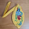 Bolsinha de japamala (bead bag) com estampa de Krishna bordada amarelo