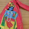 Bolsinha de Japamala estampa bordada de Krishna tocando flauta cor goiaba
