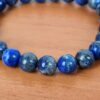 20240415_171115 Pulseira indiana pedras naturais lápis lazuli e berloque de Buda
