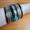 Conjunto de pulseiras indianas 15 peças preto e color floral