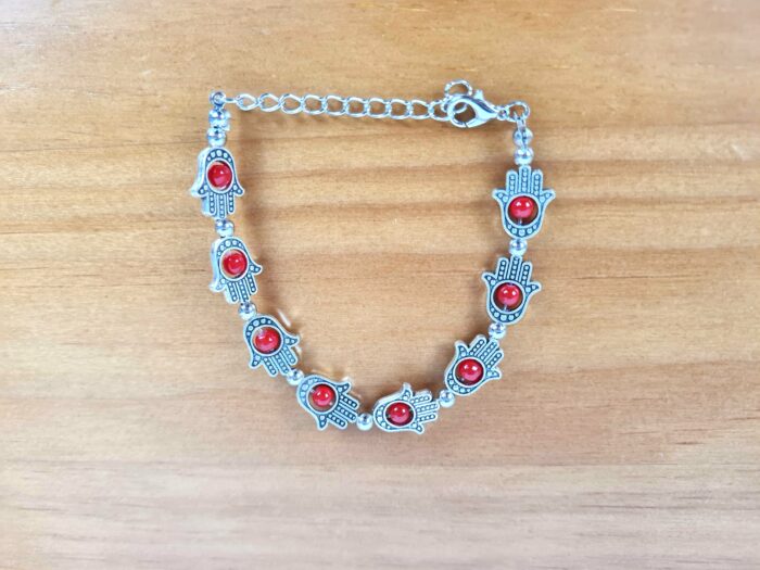 pulseira Hamsa prateada e vermelha