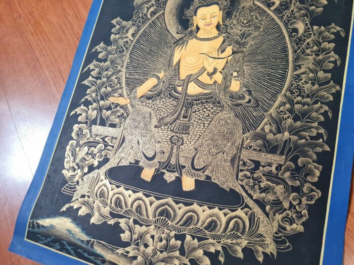 Thangka pintura tradicional tibetana que representa o Buda Maitreya