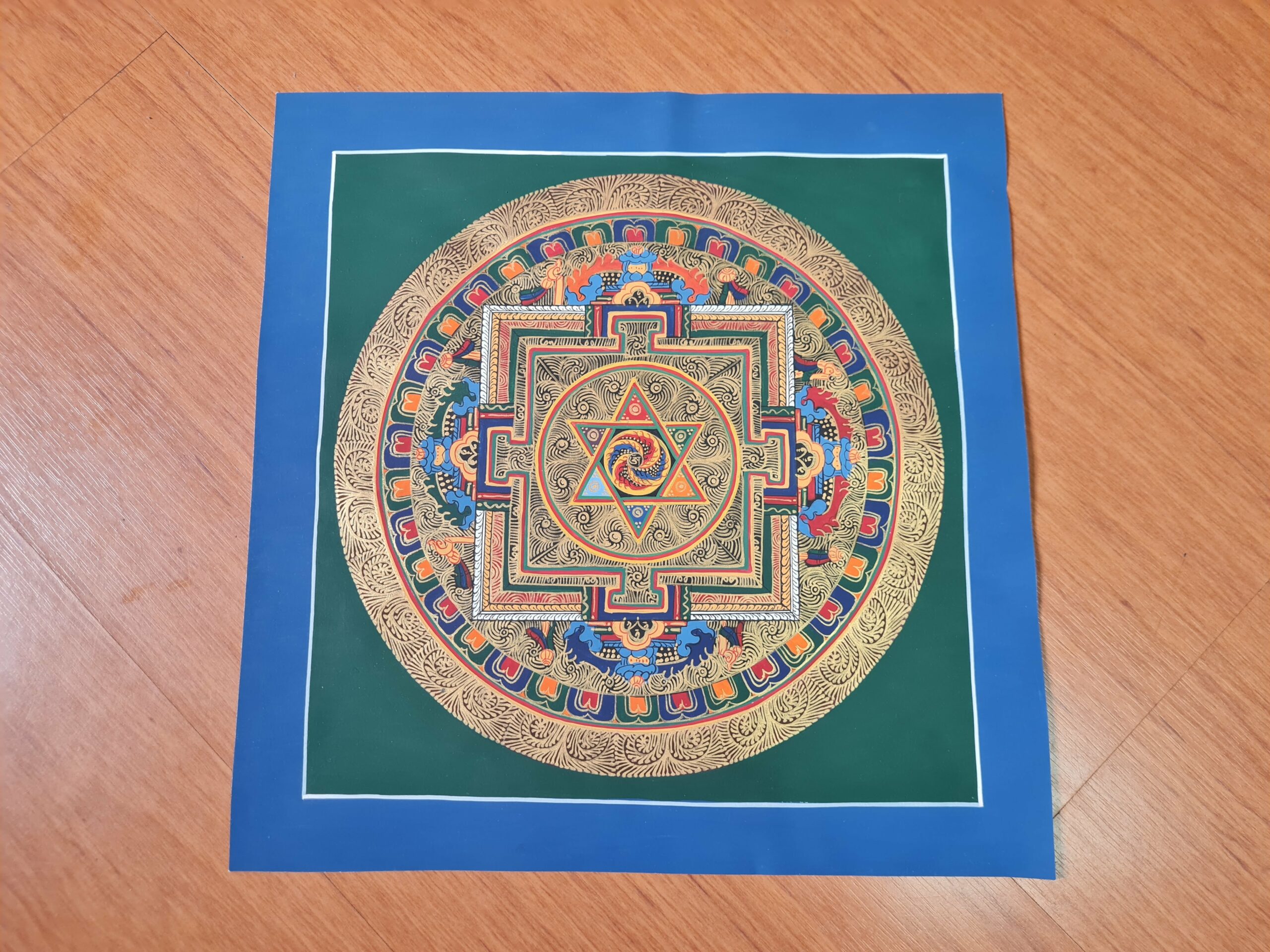 mandala pintada a mão, obra budista, para meditação