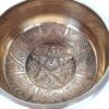 Tigela tibetana com 7 ligas dourada Buda e 8 símbolos auspiciosos 14cm