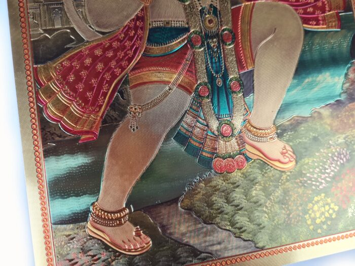 Folha laminada dourada para enquadrar Hanuman com o Monte Dronagiri