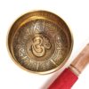 Tigela tibetana com 7 ligas dourada símbolo OM 9,5cm
