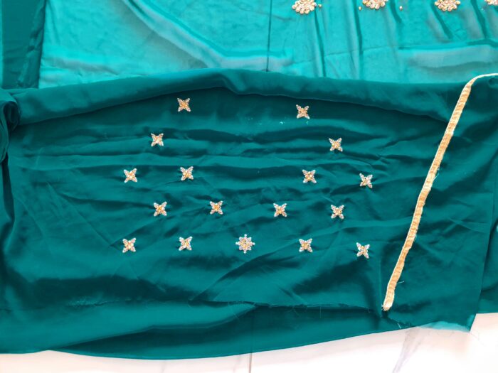 Saree luxuoso de crepe de seda verde modelo Harita Aishwarya