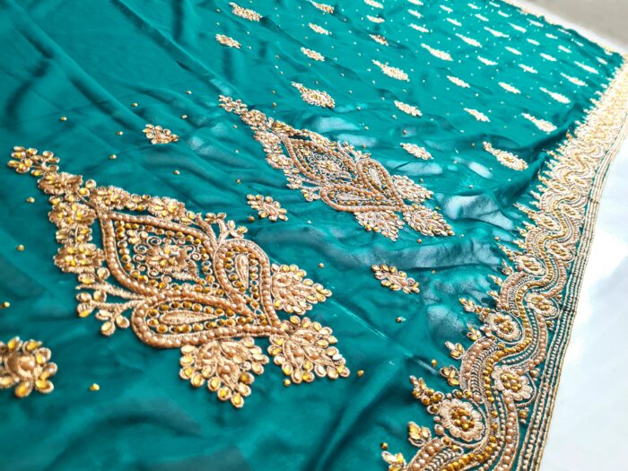 Saree luxuoso de crepe de seda verde modelo Harita Aishwarya