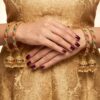 pulseira radharani indiana com sinos 4 unidades com pedras rubi e verdes Conjunto de 4 Bangles indianas design Jhumka com pedrarias Radharani